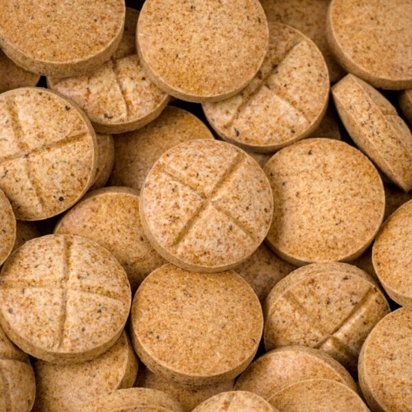 Cherry Pineapple Kratom Tablets Pile Cherry Pineapple Kratom Tablets Pile