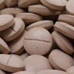 Pseudo Cherry Cola Kratom Tablets Pile